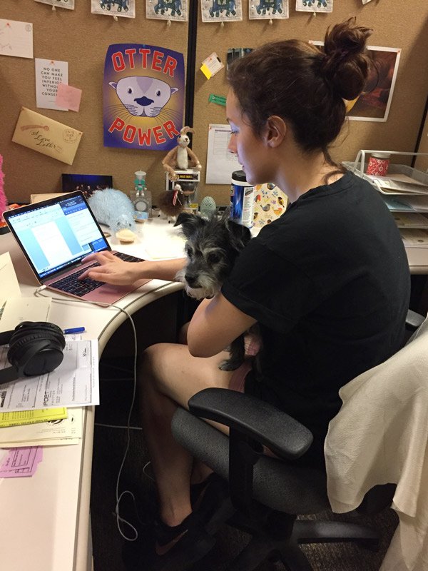 Lizzy Andretta with Lucy, at work
