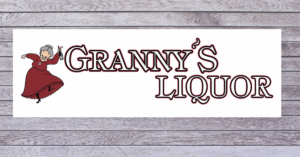 Granny's Liquor logo with barnwood background
